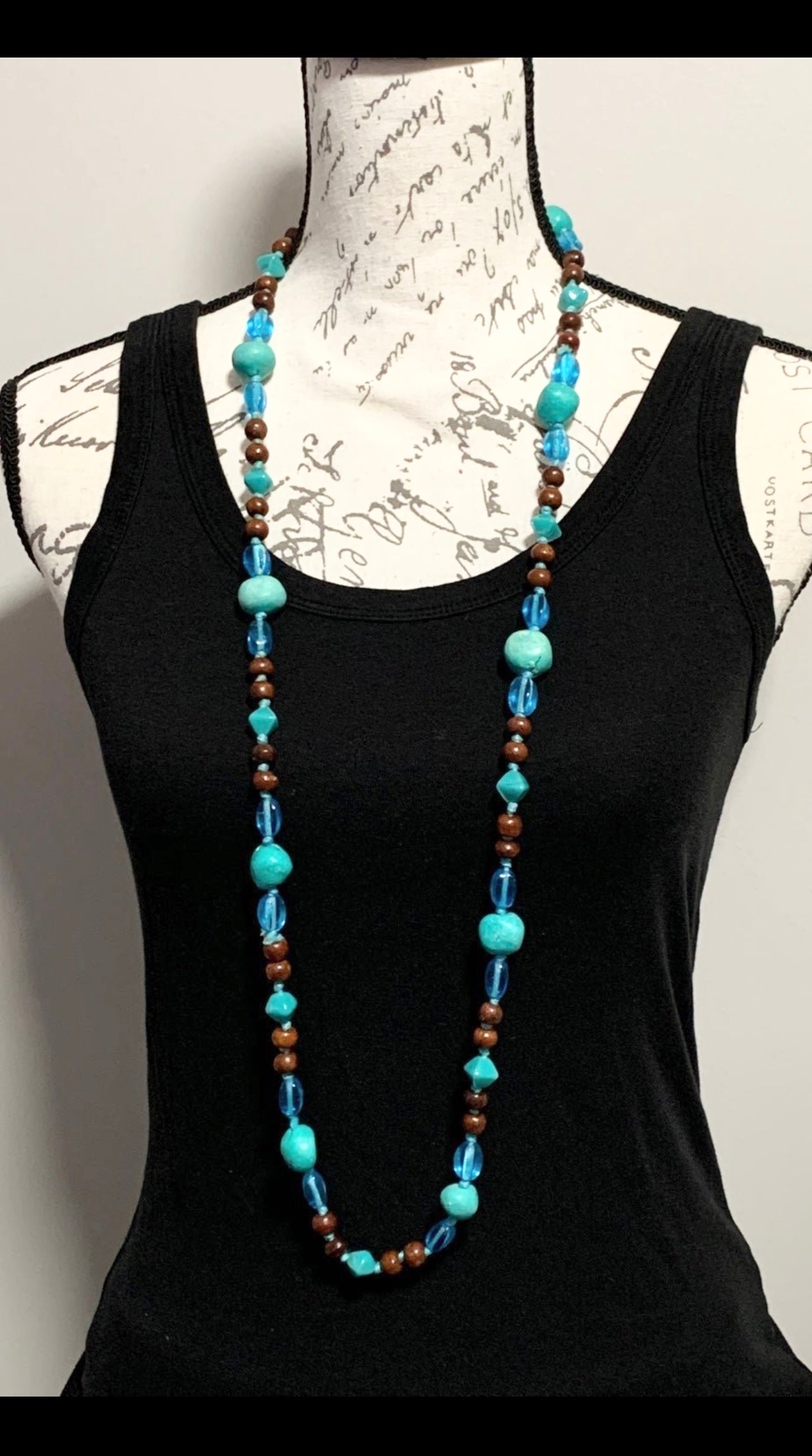 Long turquoise, wood, and Ceramic Beaded Necklace