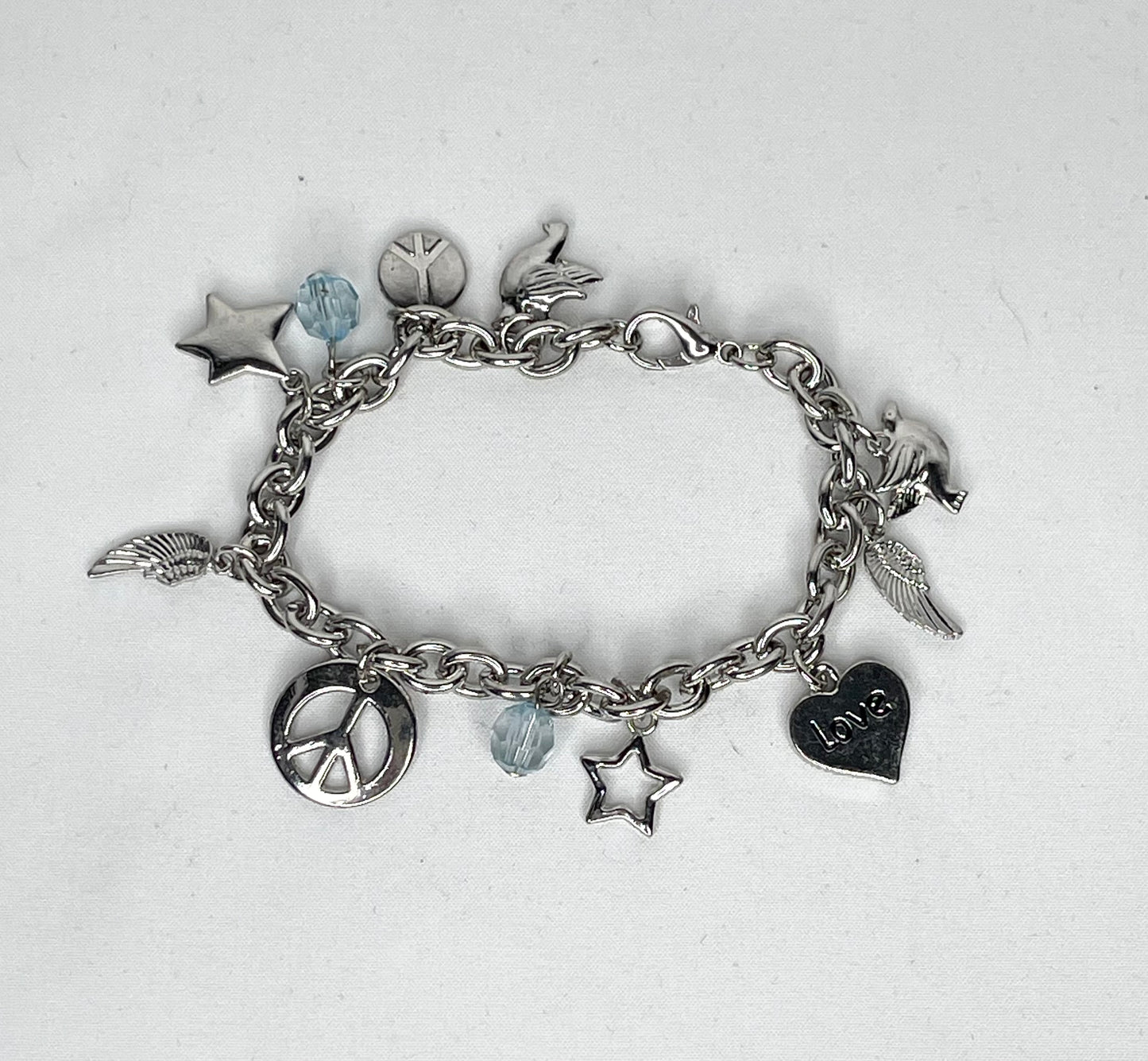 Silver Tone Peace Themed Charm Bracelet